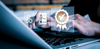 Close-up of hands typing on a laptop keyboard, with floating icons representing quality management concepts.