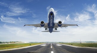 Aicraft with SunExpress livery taking off the runway